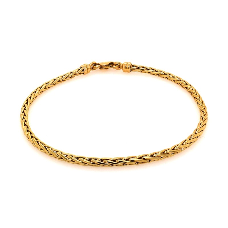 Bracelet en or jaune 750/000 maille palmier CARADOR