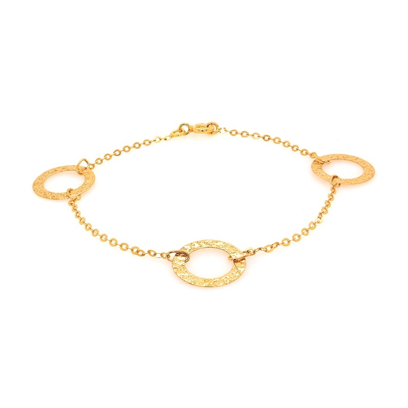 Bracelet en or jaune 750/000 triple cercles CARADOR