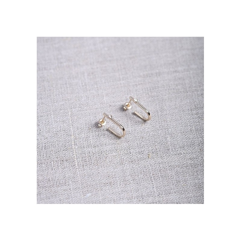 Boucles d'oreilles funanbule" plaqué or marque la garçonne