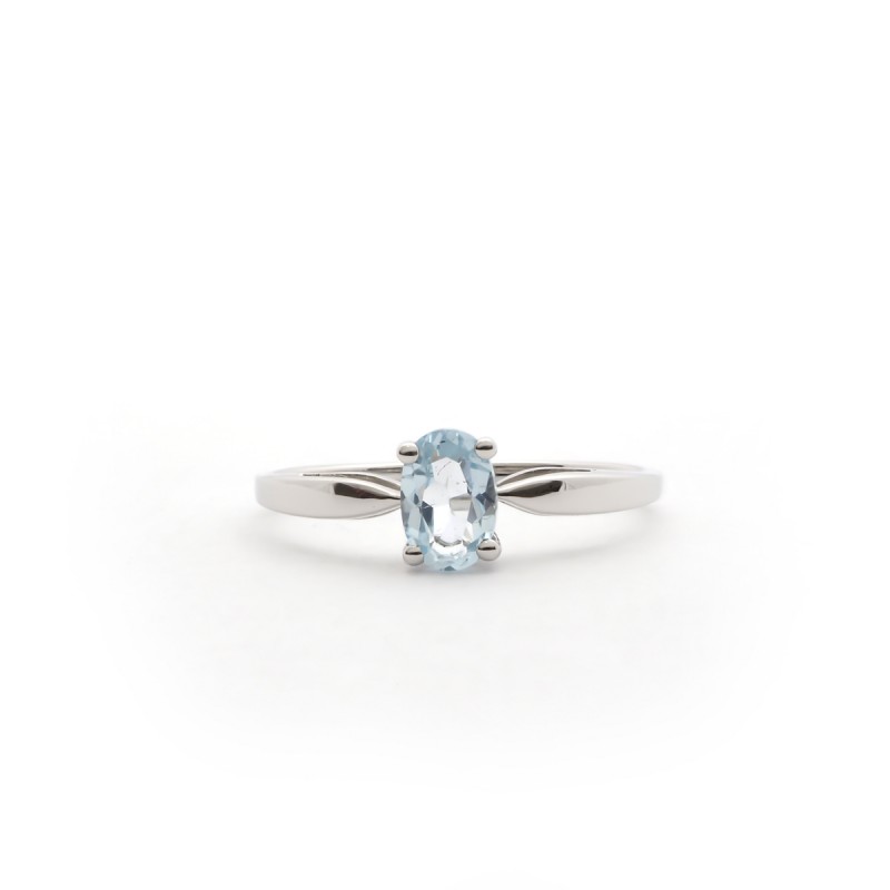 BAGUE FEMME CARADOR OR BLANC 375/000 ET SOLITAIRE TOPAZE