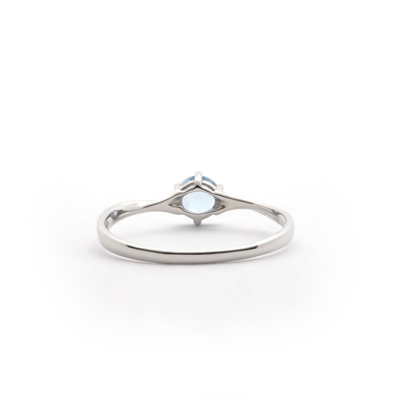 Bague solitaire 6 griffes Carador or blanc 375/000 et topaze