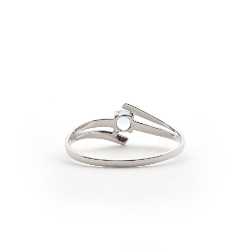 Solitaire Carador Or blanc 375/000 et topaze de 0.22 cts