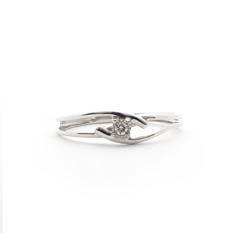 Bague solitaire fantaisie Carador 4 griffes en or blanc 375/000 et diamant 0,03 cts