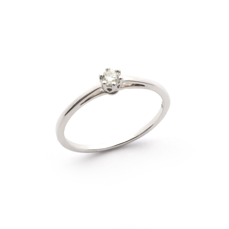 Bague solitaire Carador or blanc 375/000 et diamant 0.1 cts