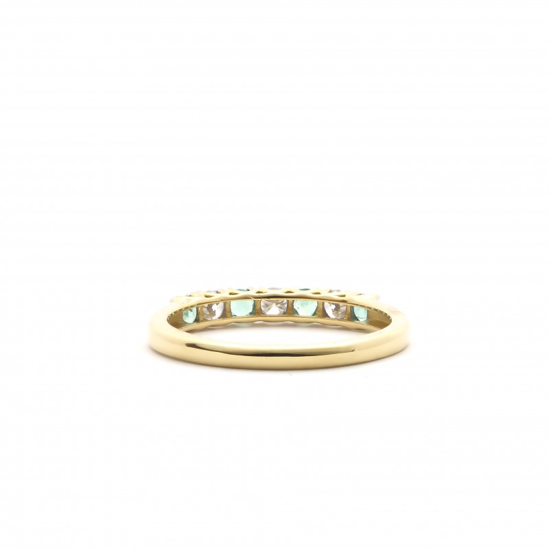 Bague Carador type alliance demi-tour emeraude et diamant sertis griffe en or jaune 750/000