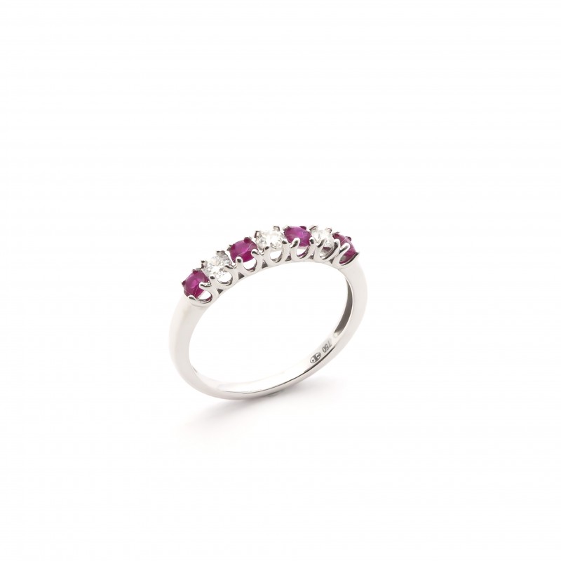 Bague Carador type alliance demi-tour rubis et diamant sertis griffe en or blanc 750/000