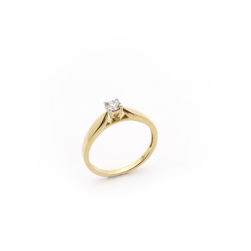 Bague solitaire en or 750/000 et son diamant 0.07CTS CARADOR