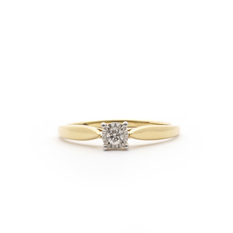 Bague solitaire en or 750/000 et son diamant 0.07CTS CARADOR