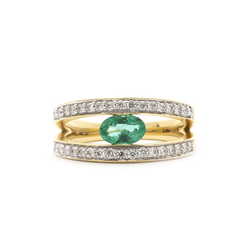 Bague en or jaune 750/000 emeraude et diamants
