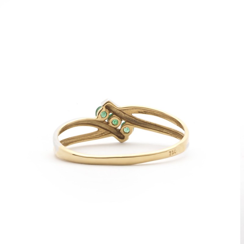 Bague en or 750/000 et sa trilogie d'emeraude