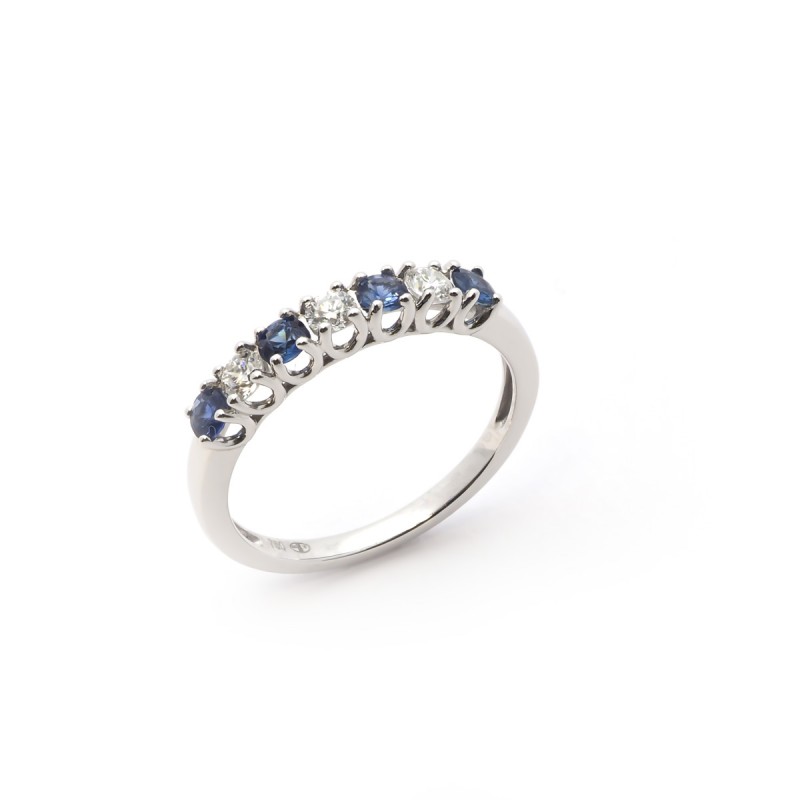 Bague Carador type alliance demi-tour saphir et diamant sertis griffe en or blanc 750/000