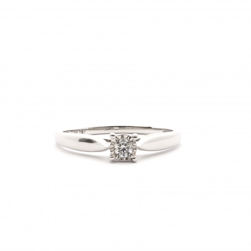 Bague solitaire en or blanc 750/000 et son diamant CARADOR