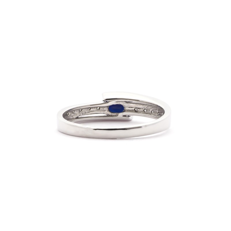 Bague Carador or blanc 750/000, diamants et saphir 0.6 cts