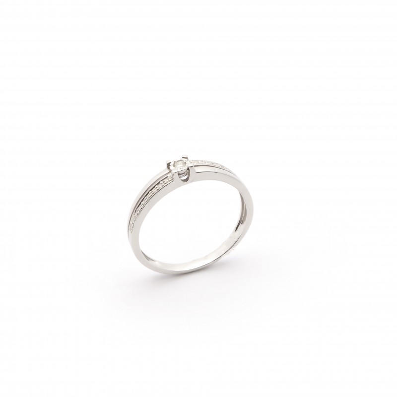 Bague solitaire accompagné Carador en or blanc  750/000 et Diamants