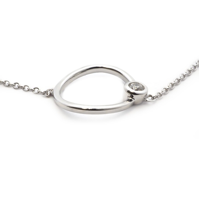 Bracelet Carador cercle or blanc 375/000 et diamant 0,03 cts