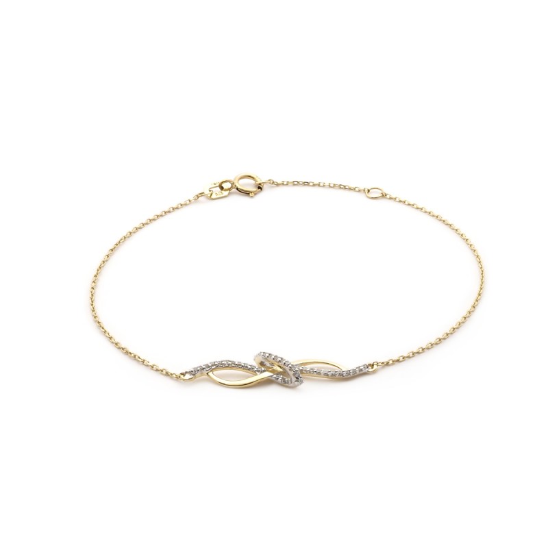Bracelet  relief en or jaune 375/000 et oxydes de zirconium CARADOR
