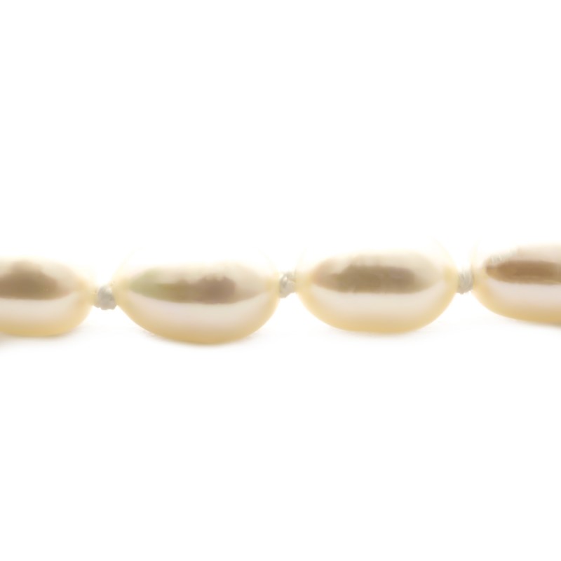 Bracelet de perles grain de riz 4 mm Carador en or 375/000