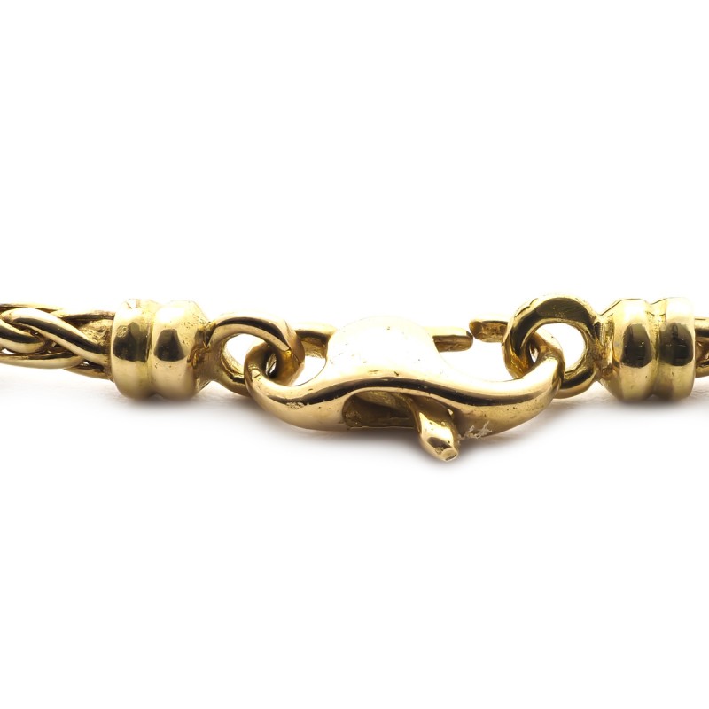 Bracelet en or jaune 750/000 maille palmierCARADOR