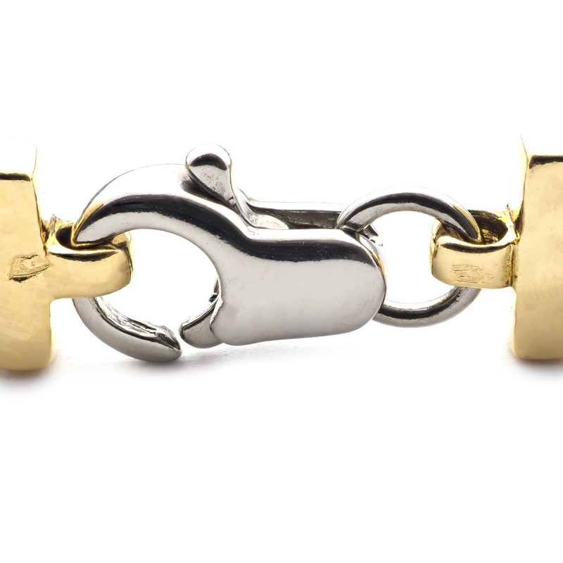 Bracelet semi-rigide en or jaune 750/000 et acier