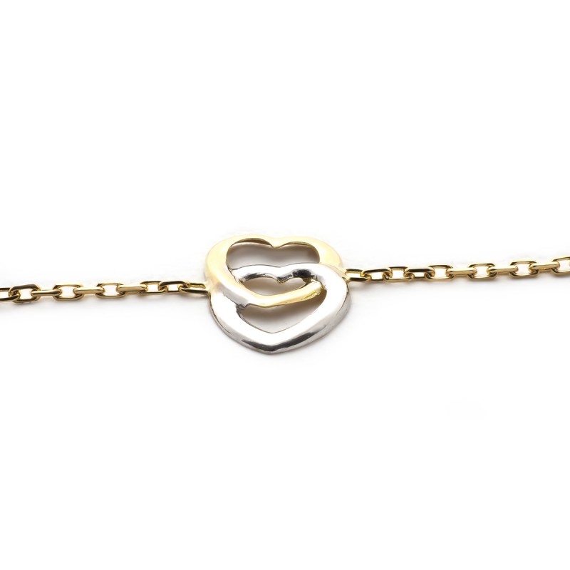 Bracelet en or jaune 750/000 maille forçat et ses cœurs CARADOR