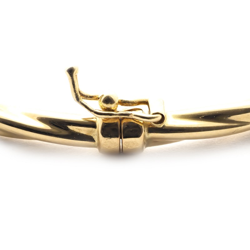 Bracelet jonc torsade carador en or jaune 750/000