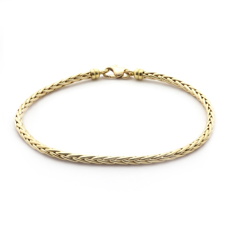 Bracelet en or jaune 750/000 maille palmier CARADOR