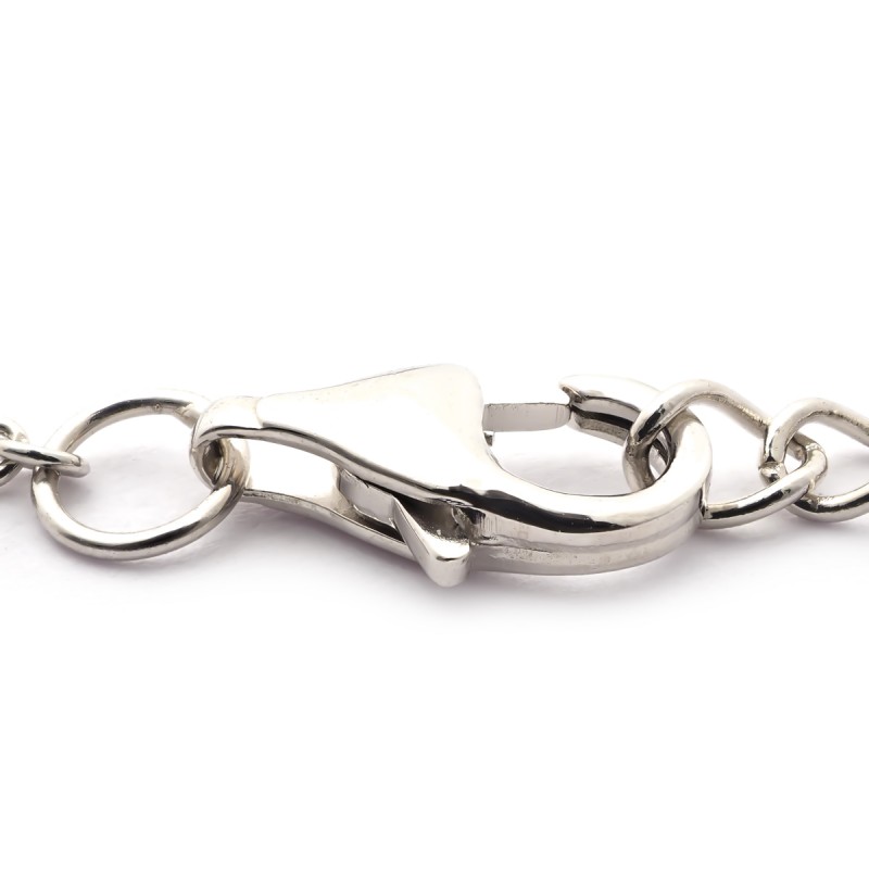 Bracelet en argent aux formes allongées et entrelacées et oxydes de zircunium noirs et blancs