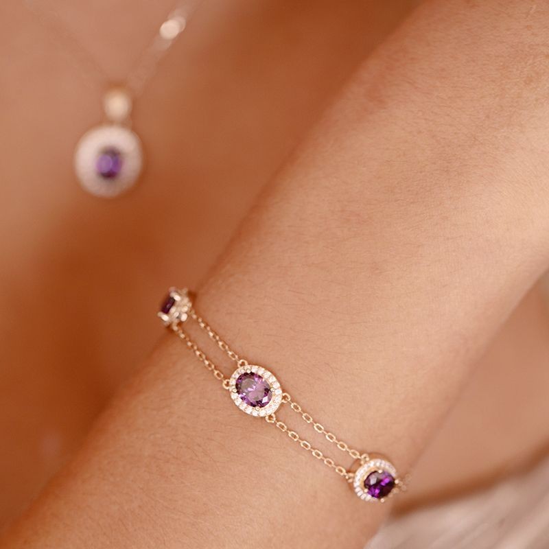 BRACELET FEMME GRIFFE ROUGE VICTORIA PLAQUE OR ET OXYDES VIOLETS