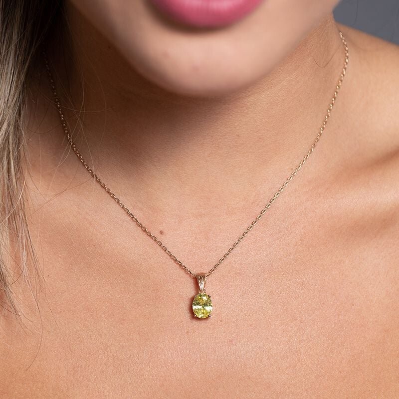 COLLIER FEMME GRIFFE ROUGE ELISABETH PLAQUE OR ET OXYDE VERT