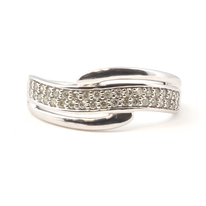 BAGUE FANTAISIE CARADOR EN OR BLANC 375/000 ET DIAMANTS 0.19 CARAT