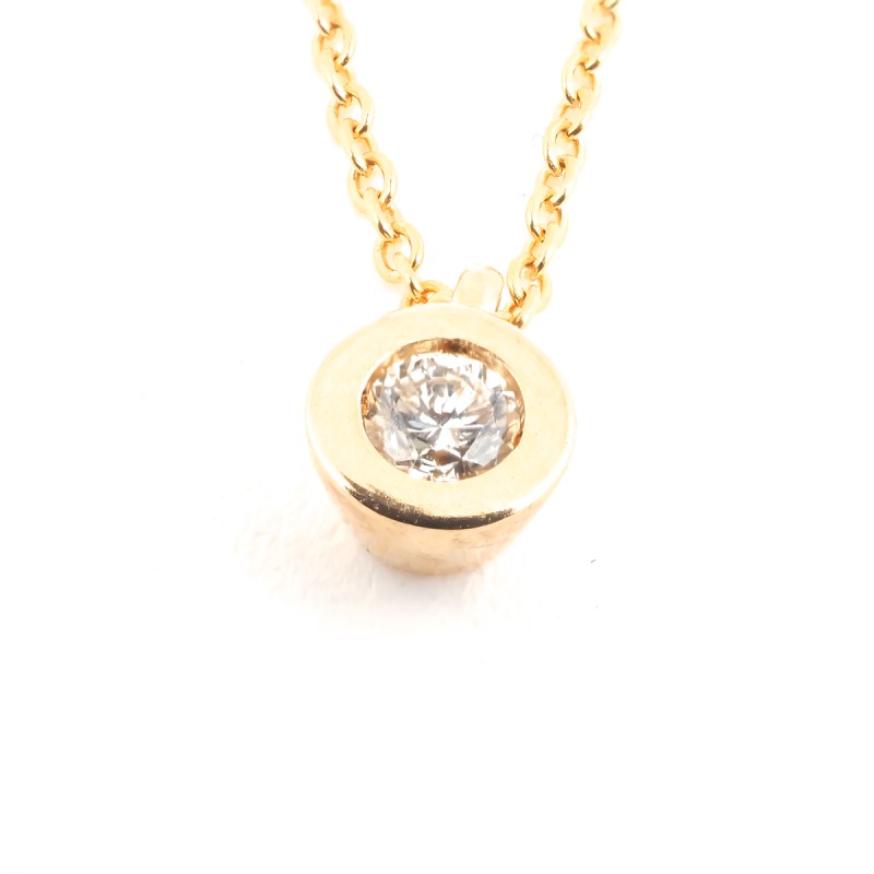 Collier solitaire femme carador en or jaune 375/000 et diamant 0.05 carats serti clos