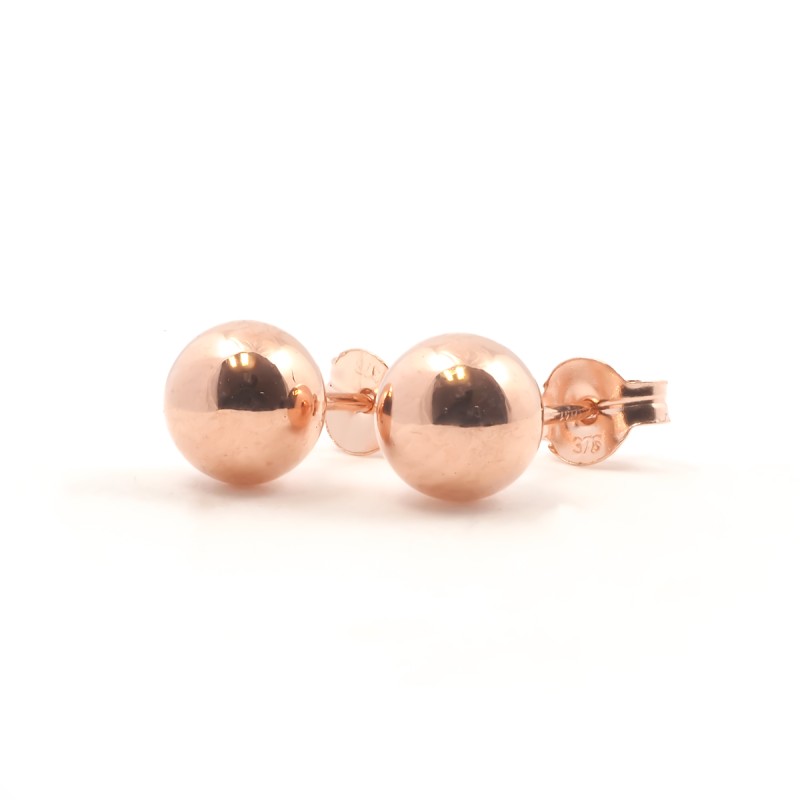 Boucles d'oreilles clous boules 5mm tout matière carador en or rose 375/000