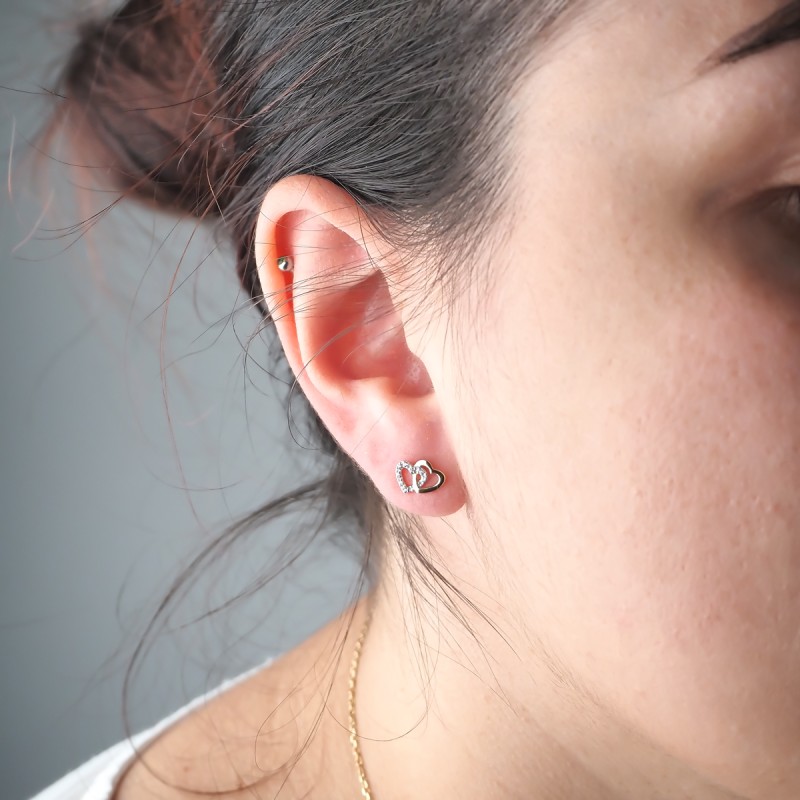 Boucles d'oreilles clous femme carador en or jaune 750/000 et oxydes de zirconium motif cœurs