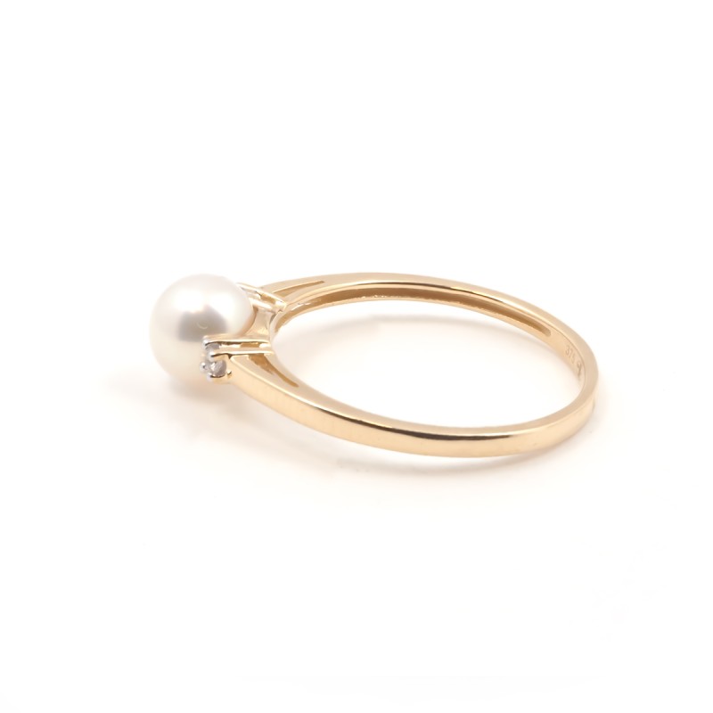 Bague fantaisie femme carador en or jaune 375/000 avec une perle de 6mm et oxydes de zirconium