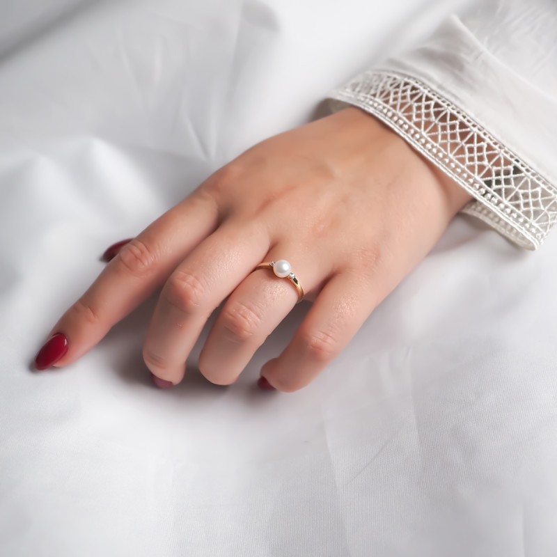 Bague fantaisie femme carador en or jaune 375/000 avec une perle de 6mm et oxydes de zirconium