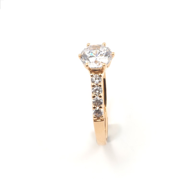 Bague solitaire accompagné or jaune 750/000 avec oxydes de zirconium