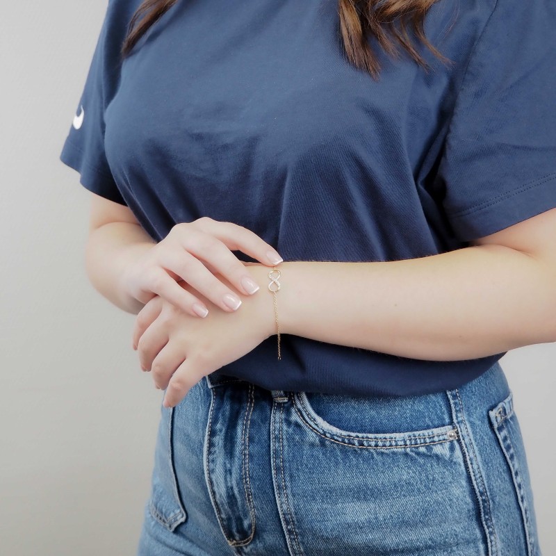 Bracelet souple Carador symbole infini plaqué or et oxydes de zirconium