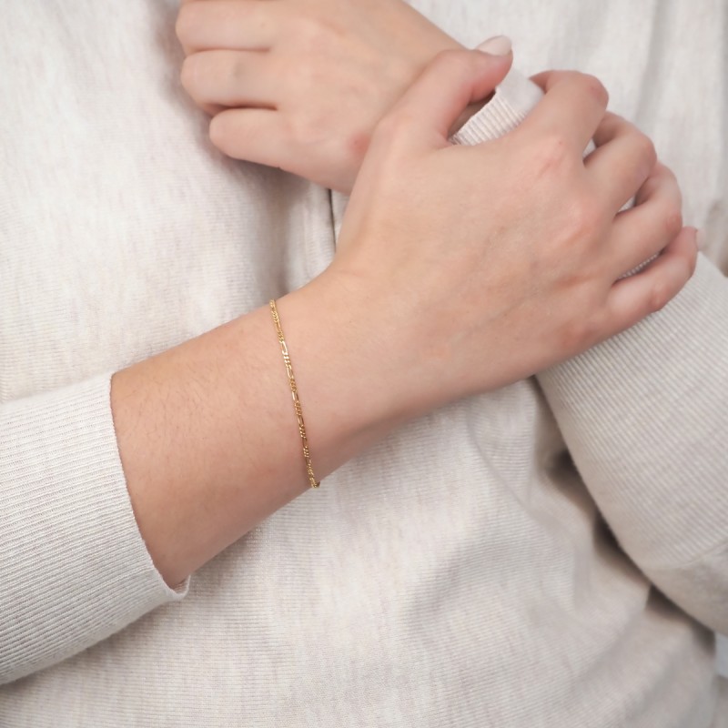 Bracelet en or jaune 375/000 maille alternée 1-3 CARADOR