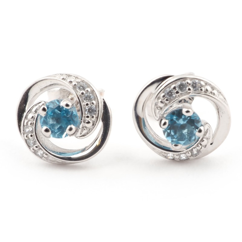 Boucles d'oreilles clous en or blanc 375/000 et topaze