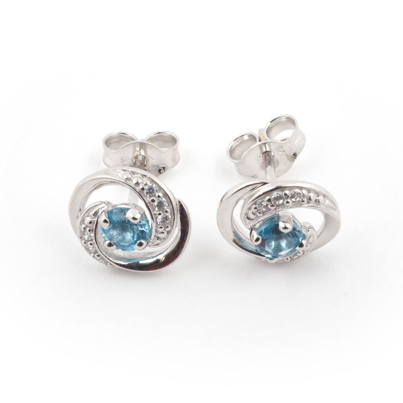 Boucles d'oreilles clous en or blanc 375/000 et topaze