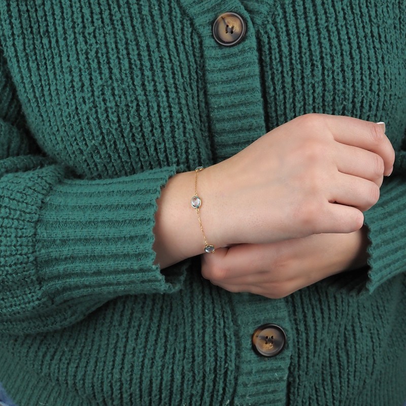 Bracelet fantaisie en or jaune 375/000 et topaze