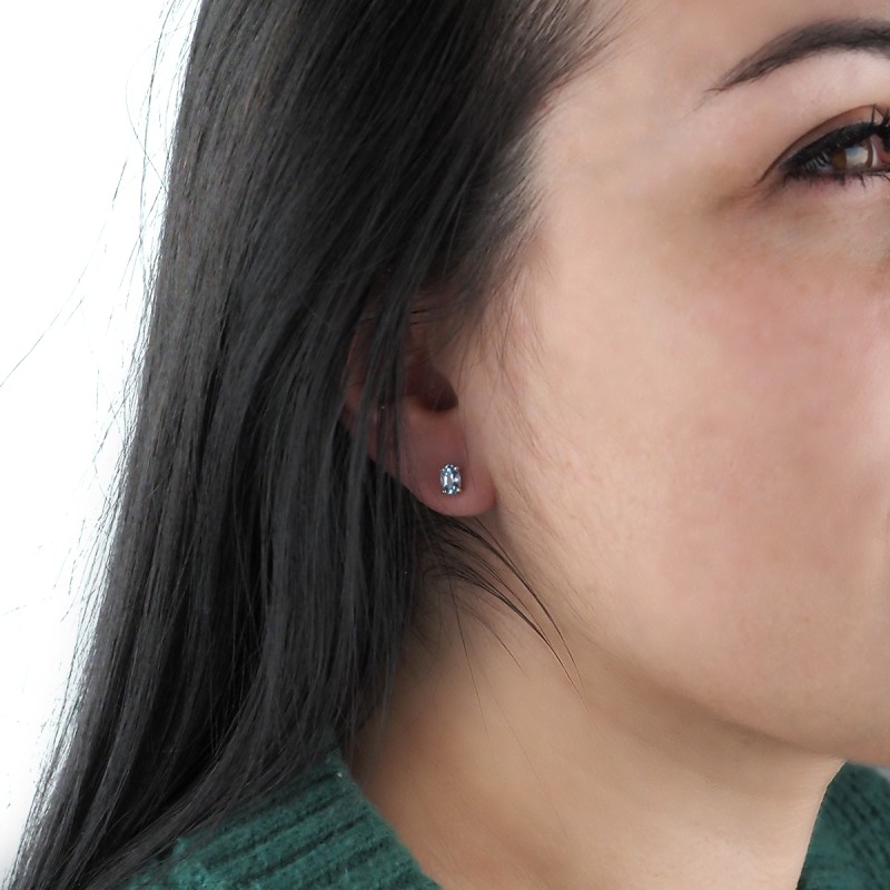 Boucles d'oreilles Carador Topaze ovale et or blanc 375/000