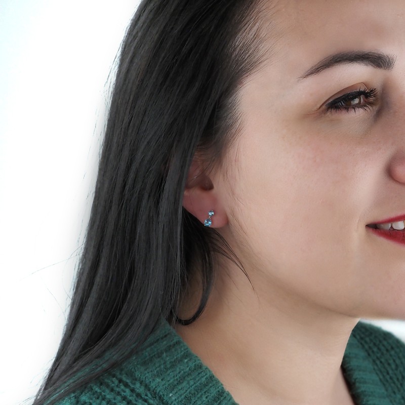 Boucles d'oreilles Carador pendantes deux topazes en or blanc 375/000