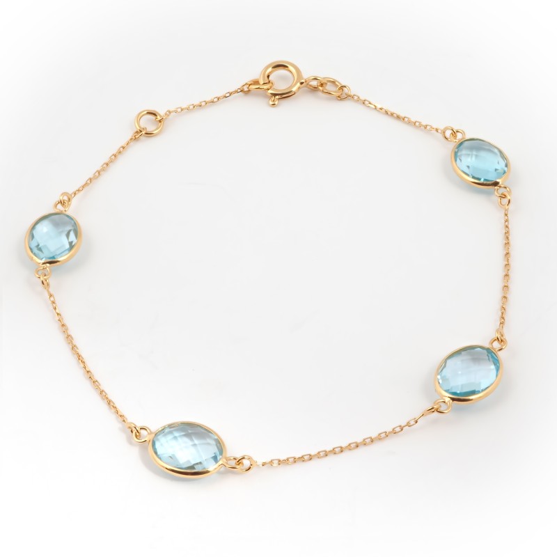 Bracelet fantaisie en or jaune 375/000 et topaze