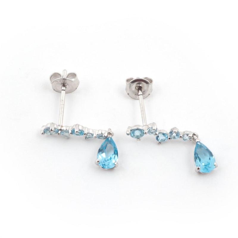 Boucles d'oreilles pendantes Carador or blanc 375/000 et Topaze