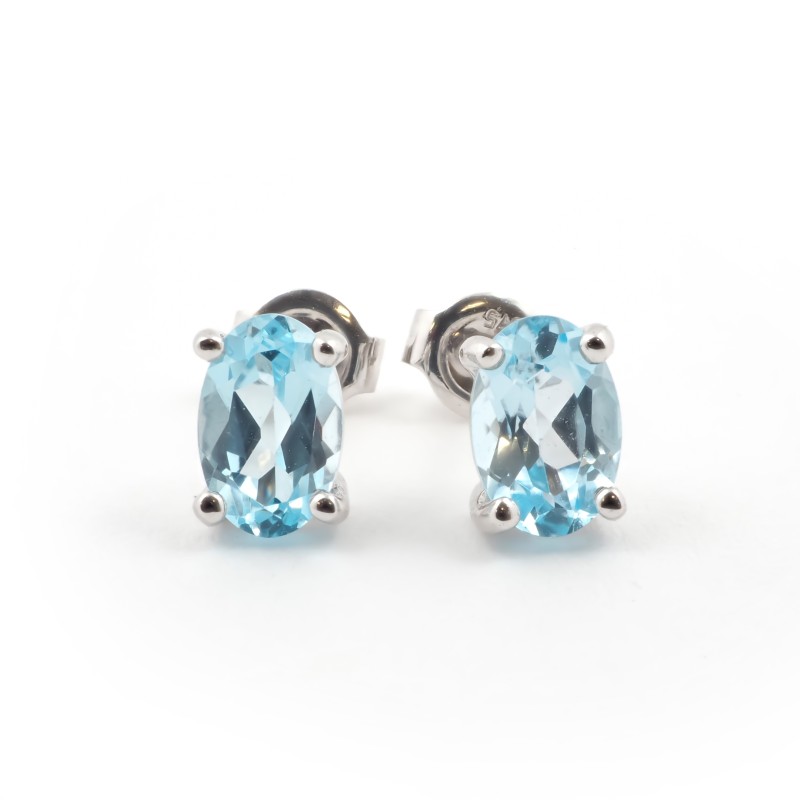 Boucles d'oreilles Carador Topaze ovale et or blanc 375/000