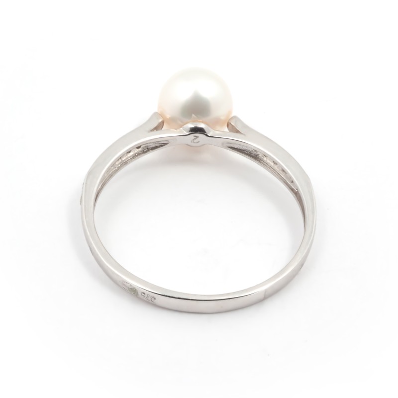 Bague solitaire accompagné  Carador en or blanc 375/000 Perle et oxydes de zirconium