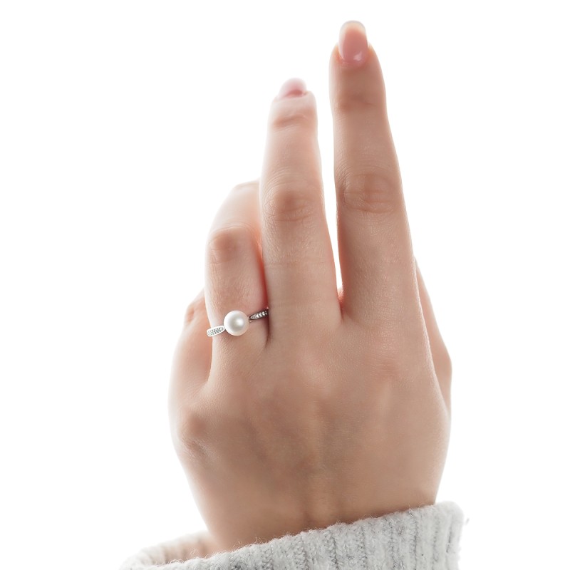 Bague solitaire accompagné  Carador en or blanc 375/000 Perle et oxydes de zirconium