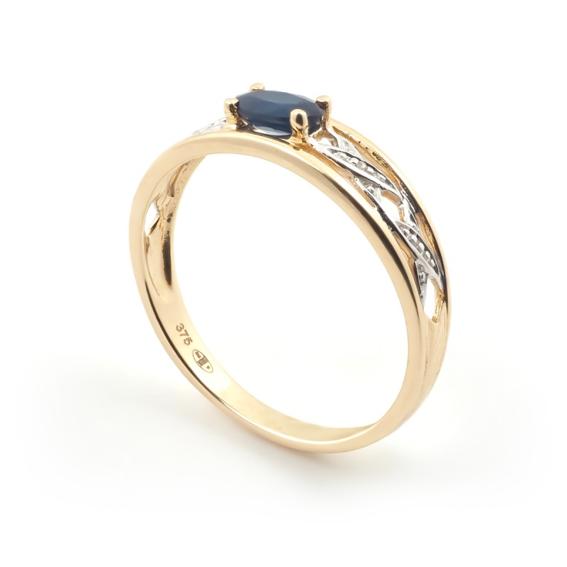 Bague Carador or jaune et blanc 375/000 et Saphir 0.35 cts