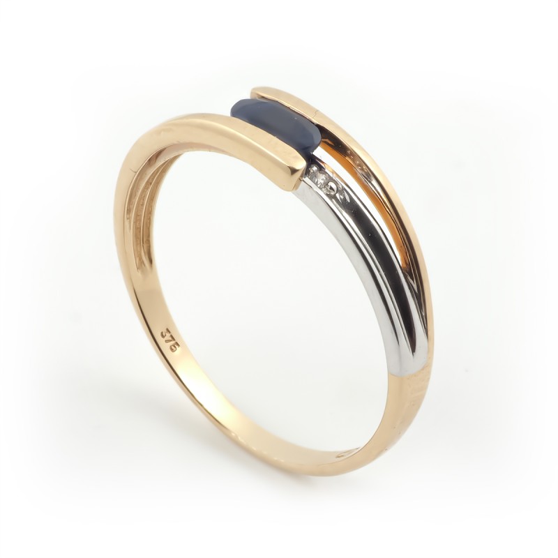 Bague Carador or jaune et blanc 375/000 et saphir 0.50 cts